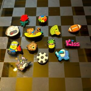 13 piece croc charm set random.  (Willing to sell separately)